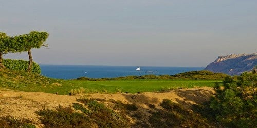 Oitavos Dunes Golf Club 14th Hole with ocean in the background, in Lisbon