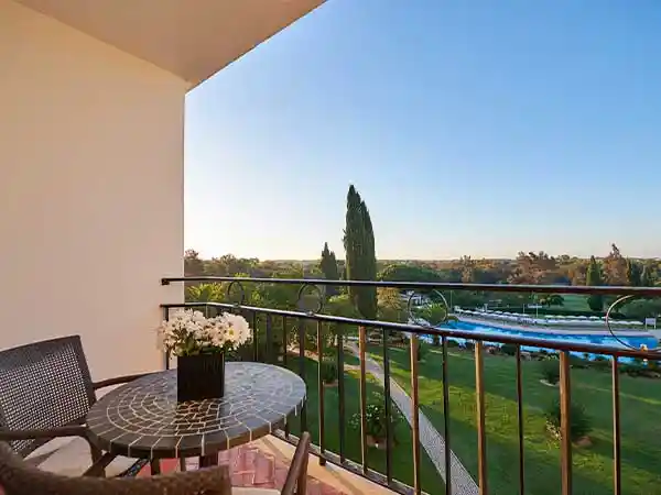 Pool-view bedroom at Penina Hotel and Golf Resort