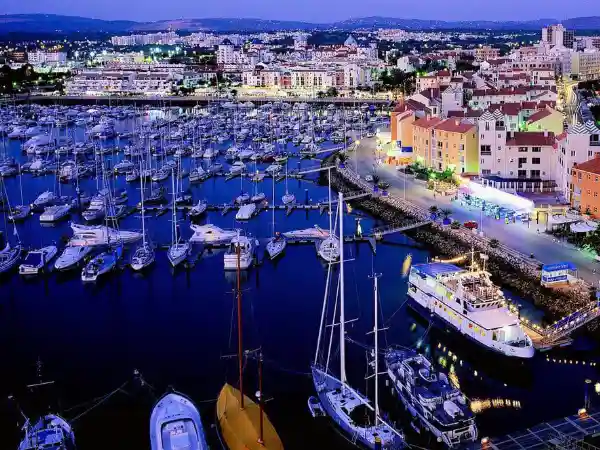 Vilamoura Marina at night for Algarve golf holidays with nightlife, restaurants and nearby championship courses